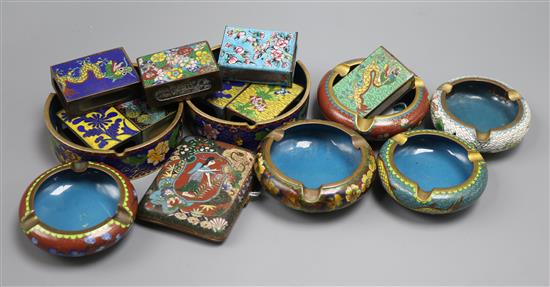 A cloisonne cigarette case, eight cloisonne match box cases and seven ashtrays,